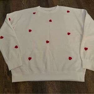 White Sweatshirt with Red Heart Accents - size medium